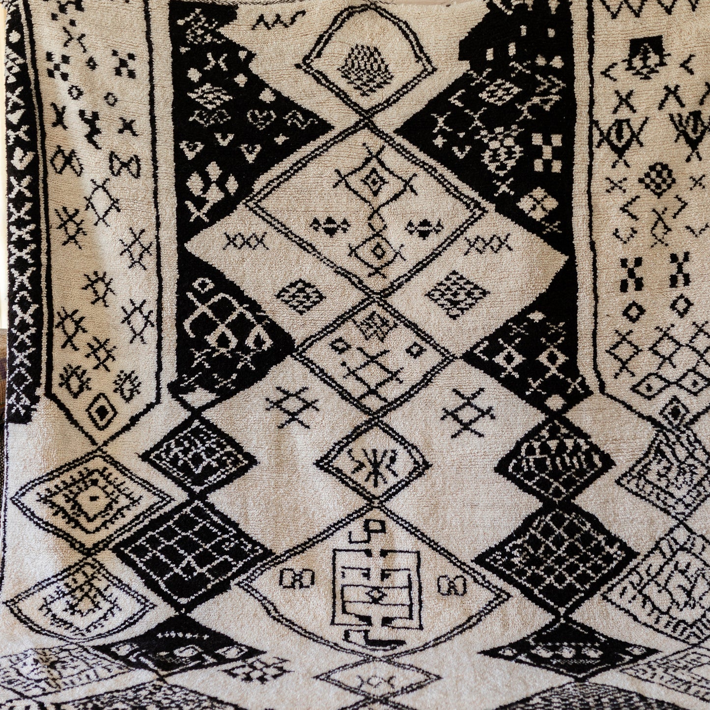 Black and White Azilal Rug – Handmade Moroccan Wool Carpet with Berber Figures