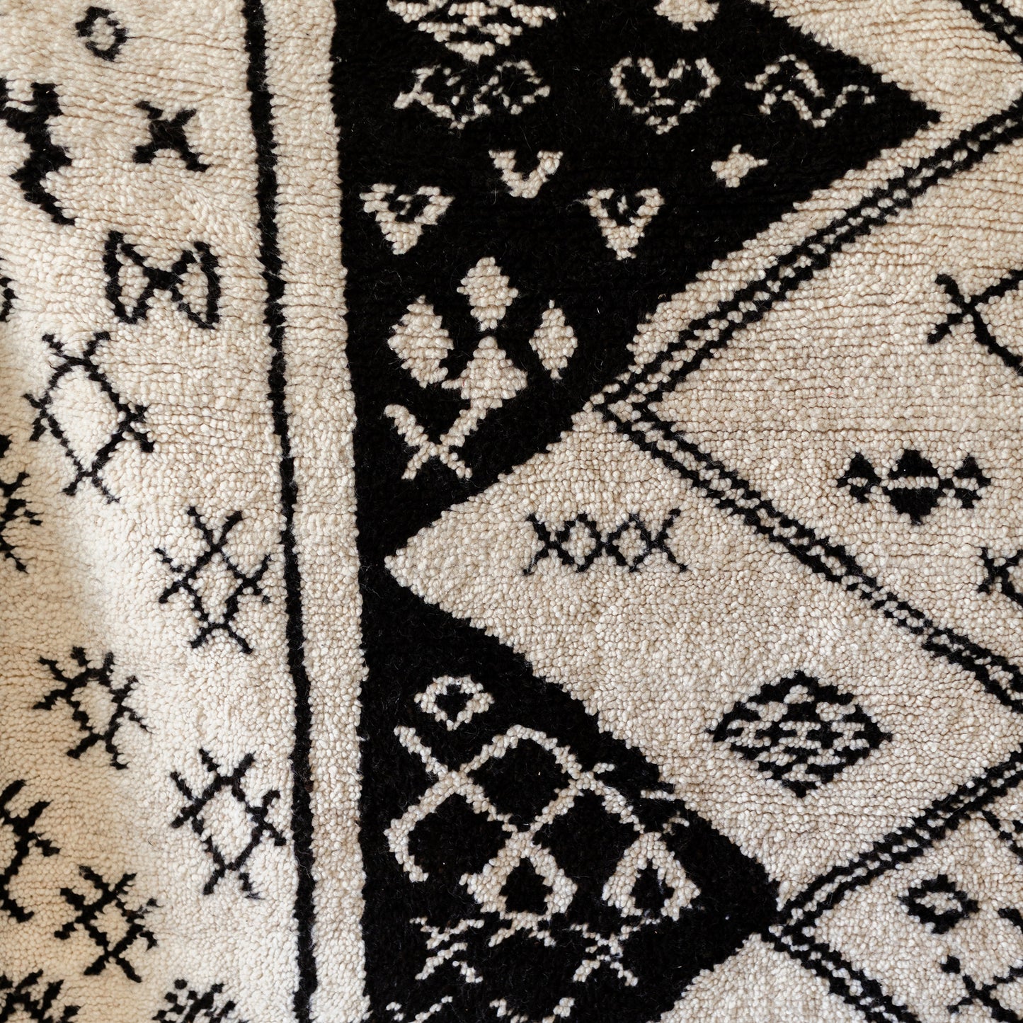 Black and White Azilal Rug – Handmade Moroccan Wool Carpet with Berber Figures